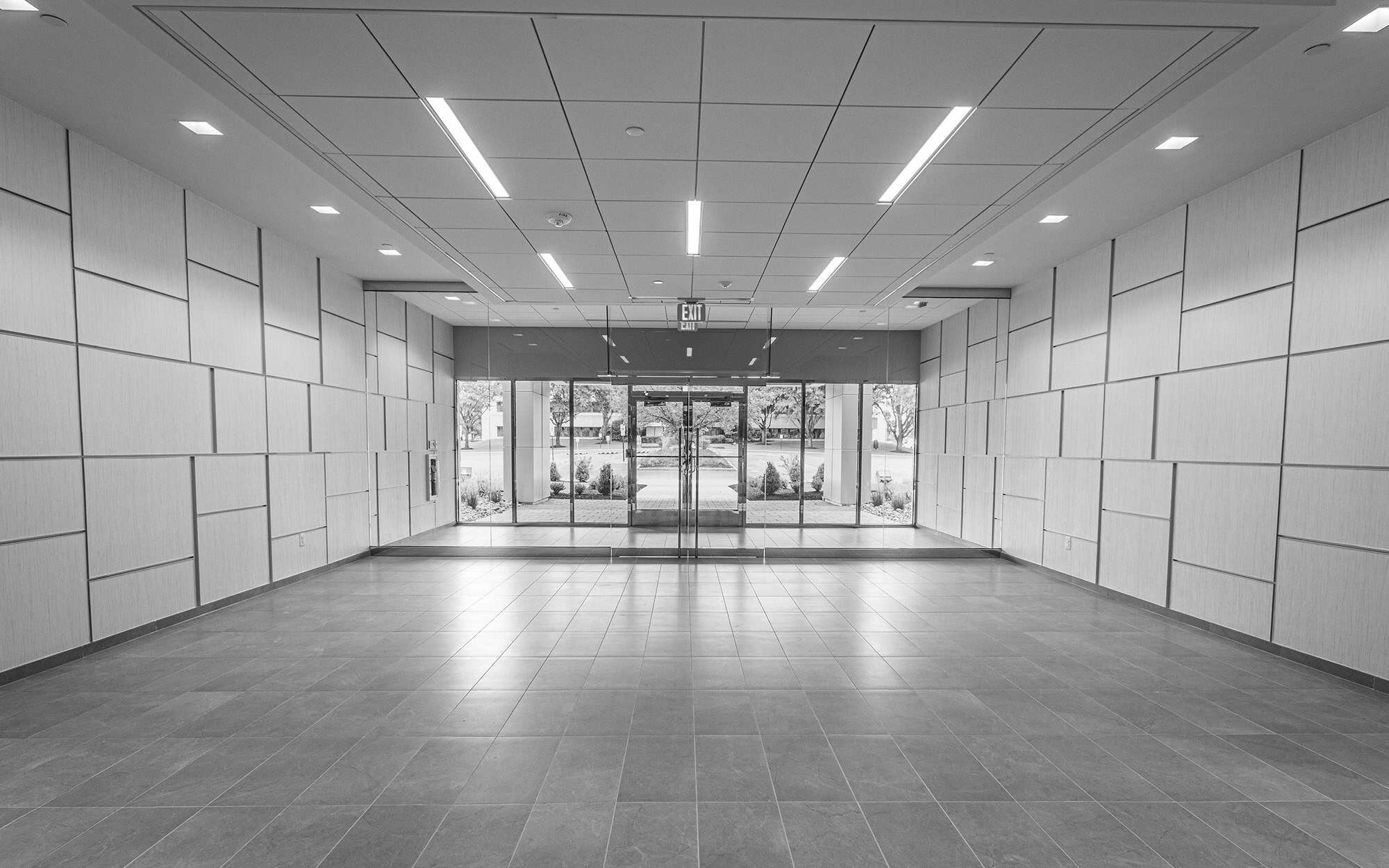 Front view of completed Connor construction build, black and white office entrance