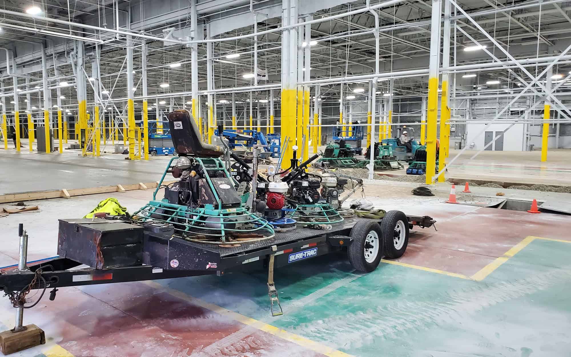 Side view of piece of equipment in industrial warehouse